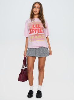 front view of model wearing Princess Polly Led Zeppelin Oversized Vintage Graphic Top Pink Half Sleeves Crew Neck 