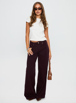 front view of model wearing Princess Polly Big News Mid Rise Wide Leg Jeans Currant Mid Rise Jeans 