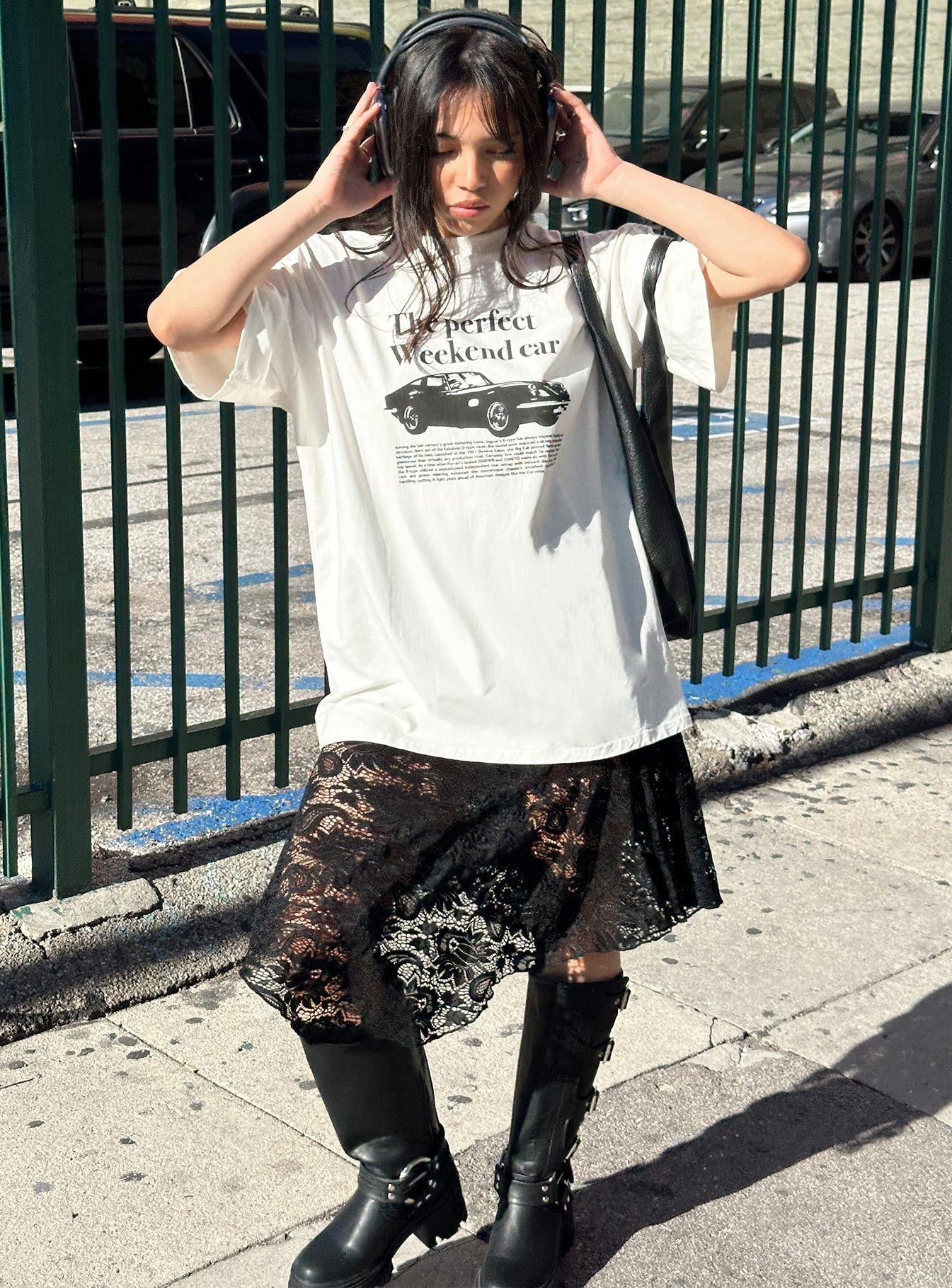 Front view of model wearing  front Vana Midi Skirt Jet Black Princess Polly  