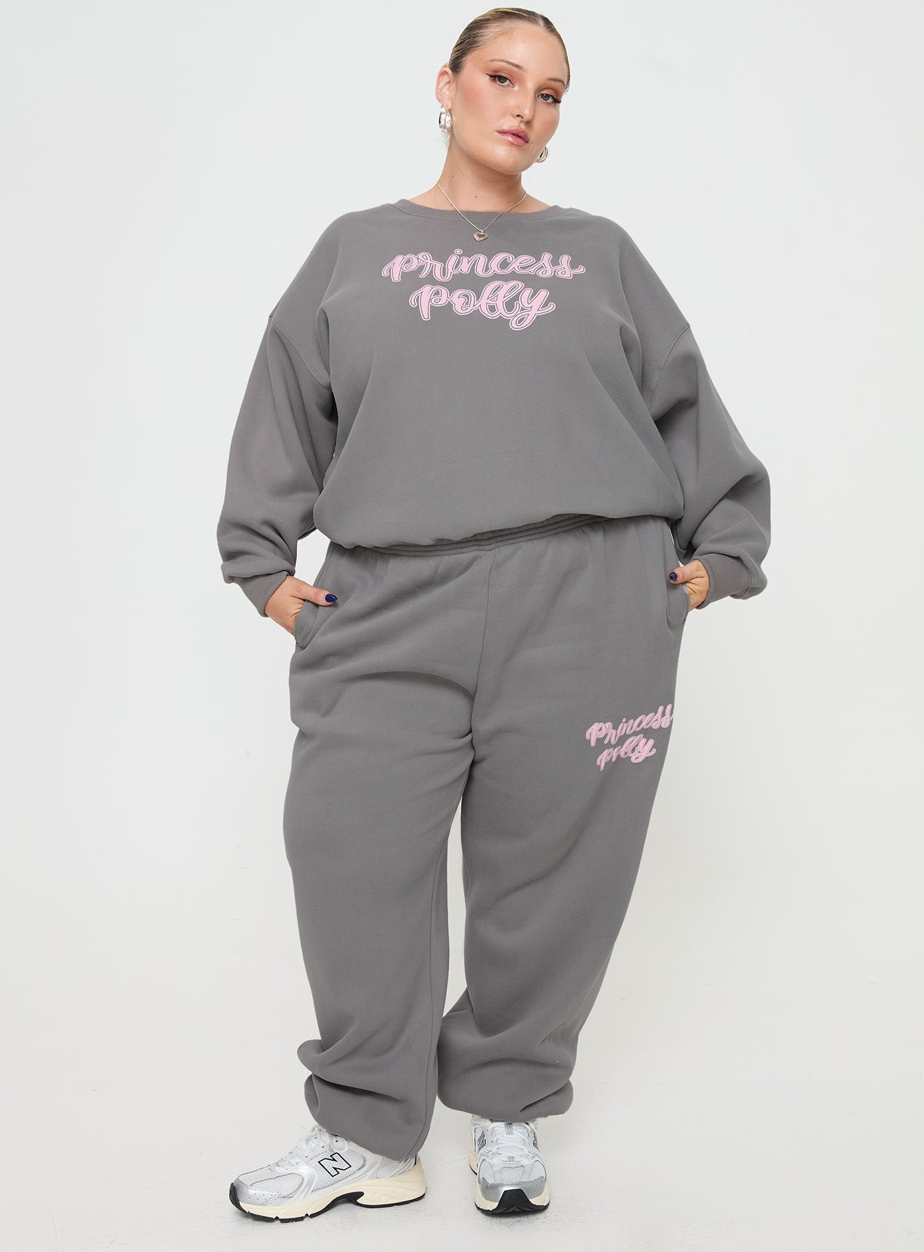 front view of model wearing Princess Polly Princess Polly Track Pants Puff Text Charcoal Curve 