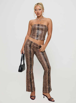 side view of model wearing Princess Polly Kinniya Strapless Top Brown Multi Sleeveless straight 