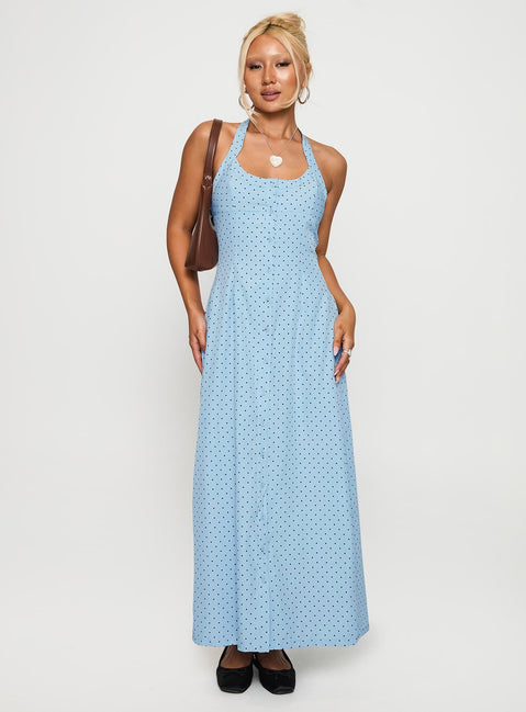 side view of model wearing Princess Polly Mallorie Halter Maxi Dress Blue / Black Polka Scoop Neck 