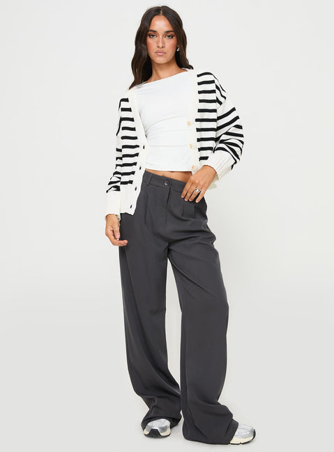 side view of model wearing Princess Polly Karlson Striped Cardigan Cream / Black cropped 