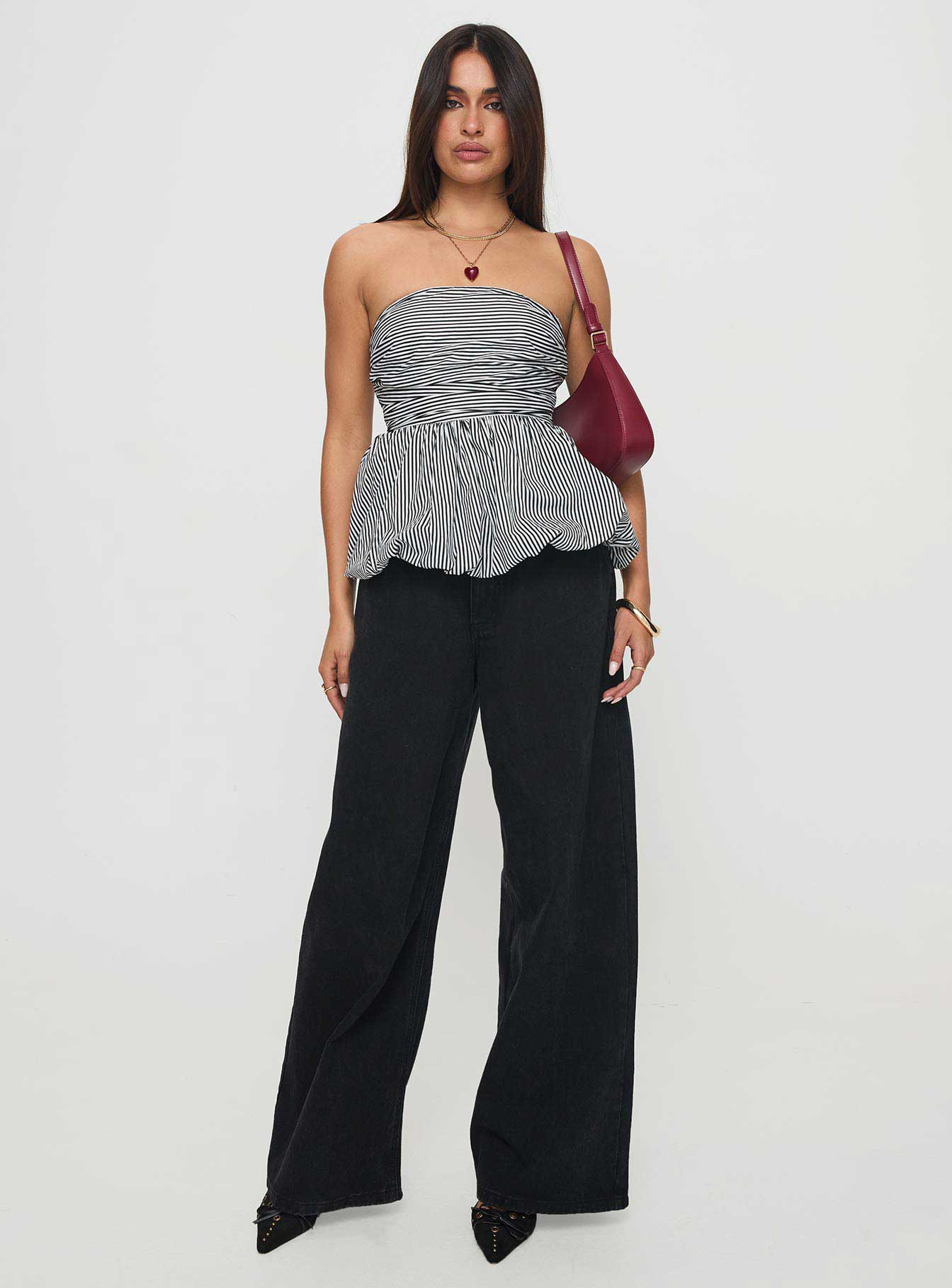 front view of model wearing Princess Polly Selenea Bubble Hem Top Black / White Sleeveless straight 