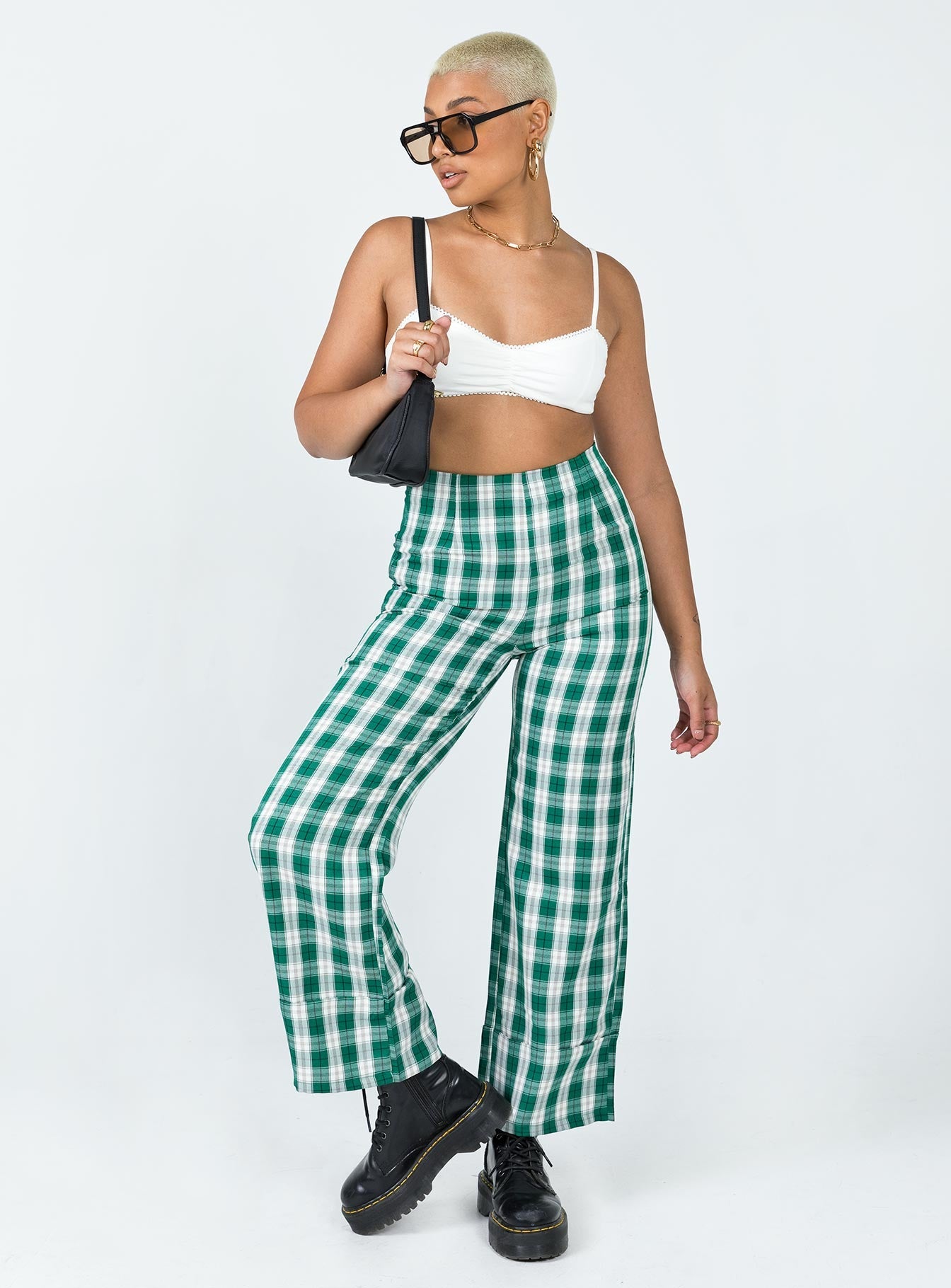 front view of model wearing Princess Polly Euros Pants Green Tartan 