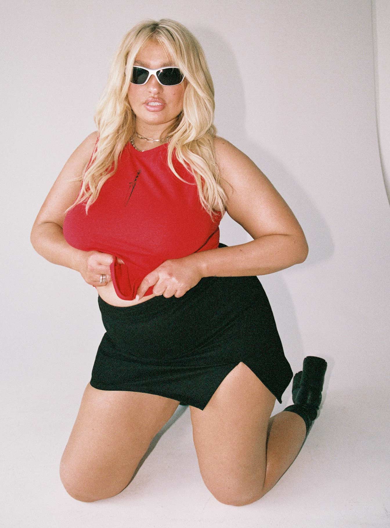 Front view of model wearing  front Madison Mini Skirt Black Curve Princess Polly  Mini Skirts 