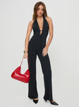 Jumpsuit Plunging neckline, halter style, silver-toned buckle detail at bust, straight leg fit Good stretch, unlined  Princess Polly Lower Impact 