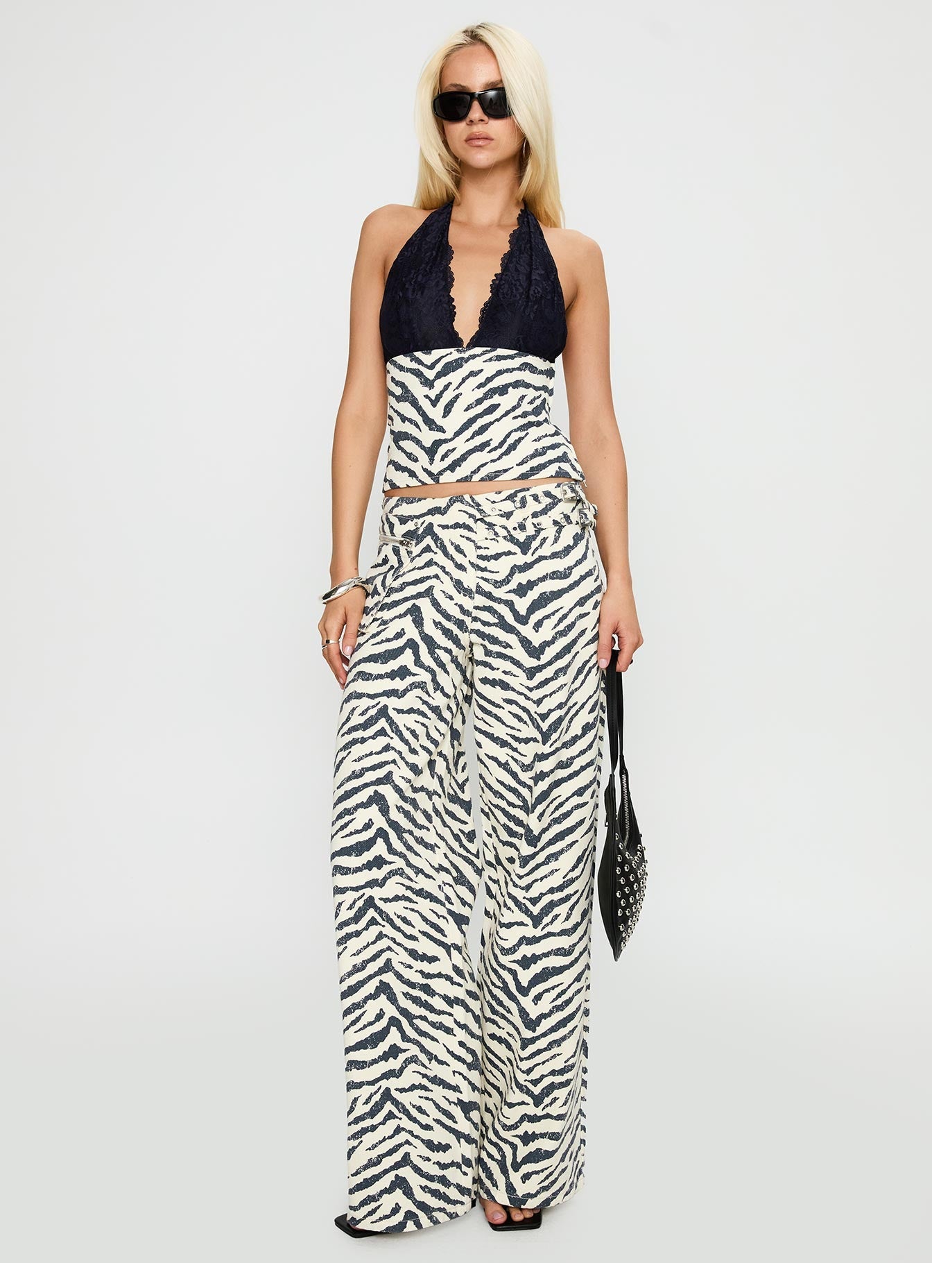 side view of model wearing Princess Polly Paltrow Cargo Pant Zebra High Waisted 