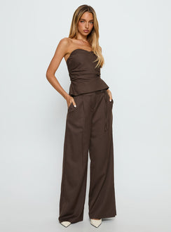side view of model wearing Princess Polly Natilee Relaxed Tailored Pants Brown Pinstripe Low Rise Pants 