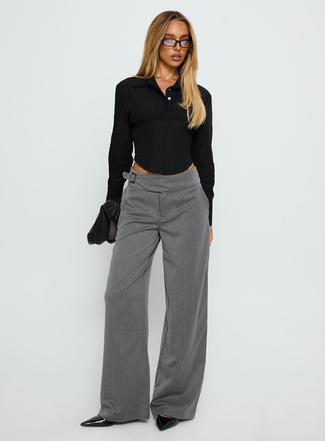 front view of model wearing Princess Polly Jinny Relaxed Buckle Tailored Pants Grey Pinstripe Low Rise Pants 