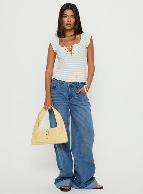 front view of model wearing Princess Polly Jacobie Mid Rise Wide Leg Jeans Mid Blue Wash Mid Rise Jeans 