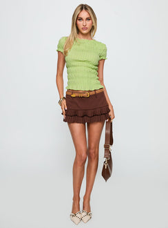 side view of model wearing Princess Polly Romelle Shirred Top Lime Short Sleeves High Neck 