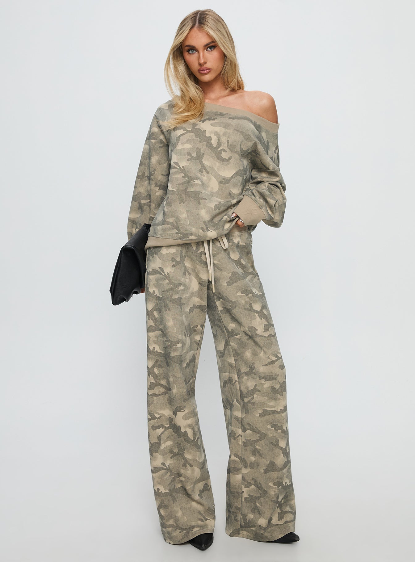 front view of model wearing Princess Polly Dodie Wide Leg Pants Camo High Rise Pants 
