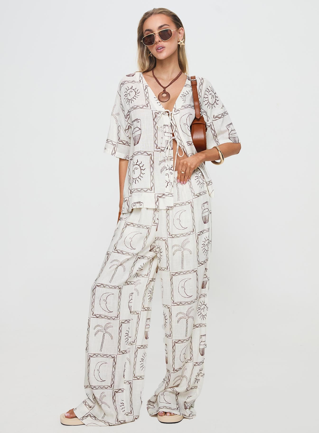 front view of model wearing Princess Polly Sun Dream Pants Cream / Multi High Waisted Pants 