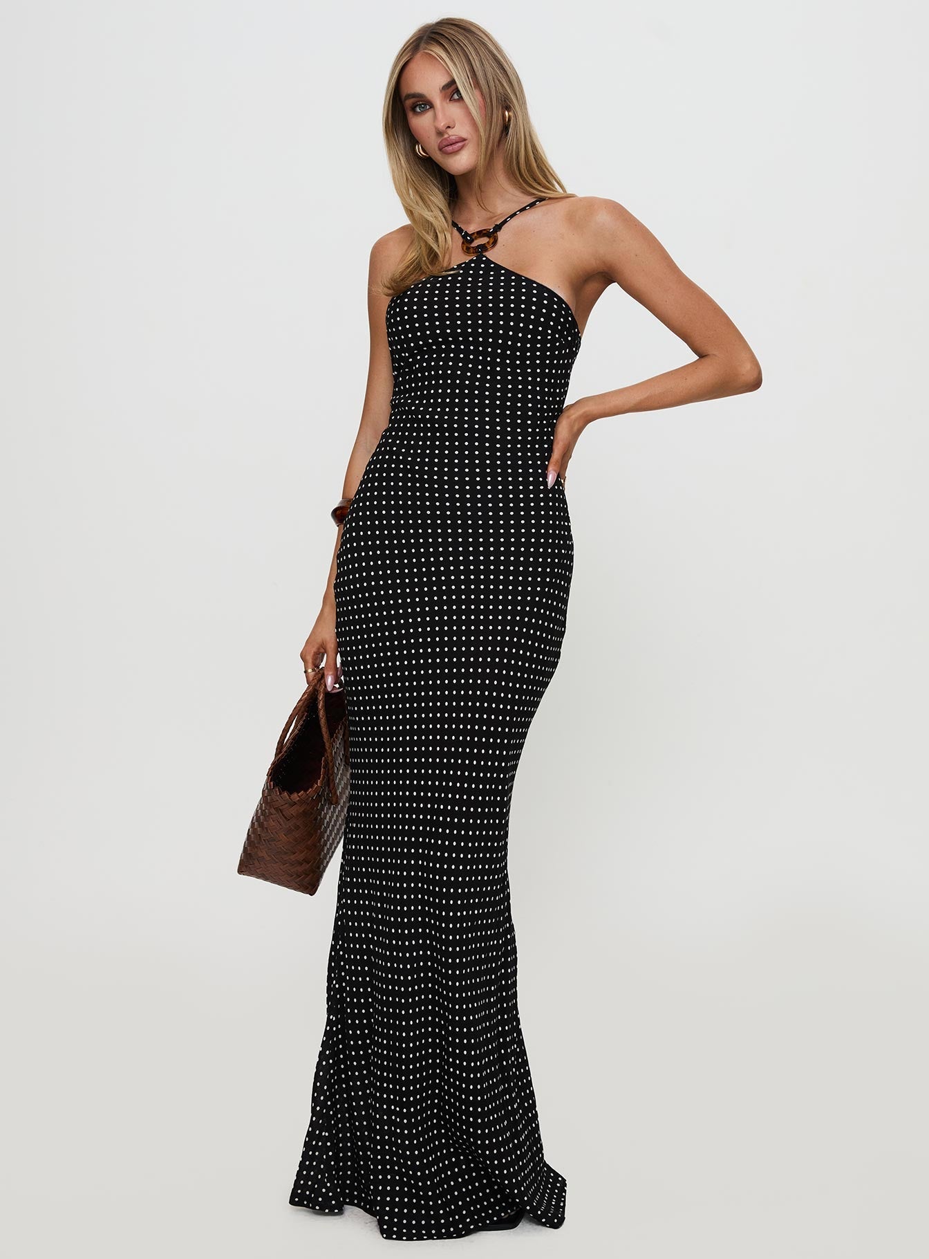 front view of model wearing Princess Polly Evyn Halter Maxi Dress Polka Dot Asymmetric Neckline 