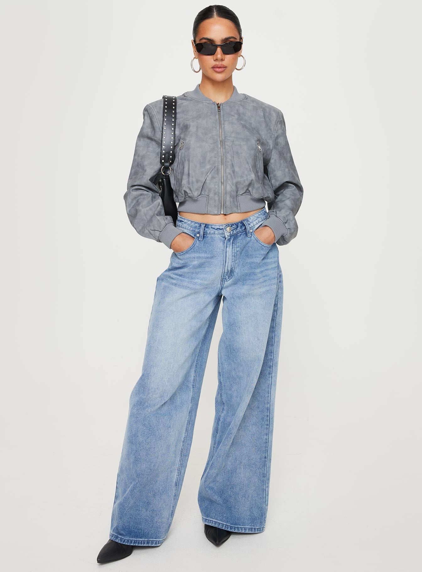 Faux leather bomber jacket High neckline, zip fastening, twin hip pockets, elasticated waistband and cuff Non-stretch material, fully lined 