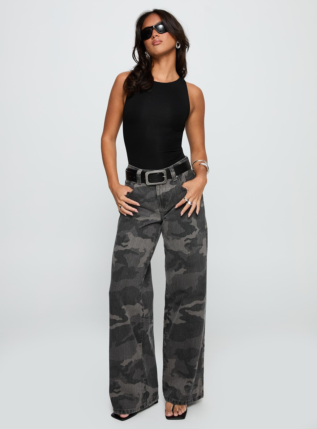 front view of model wearing Princess Polly Majesty Tie Back Bodysuit Black Sleeveless 