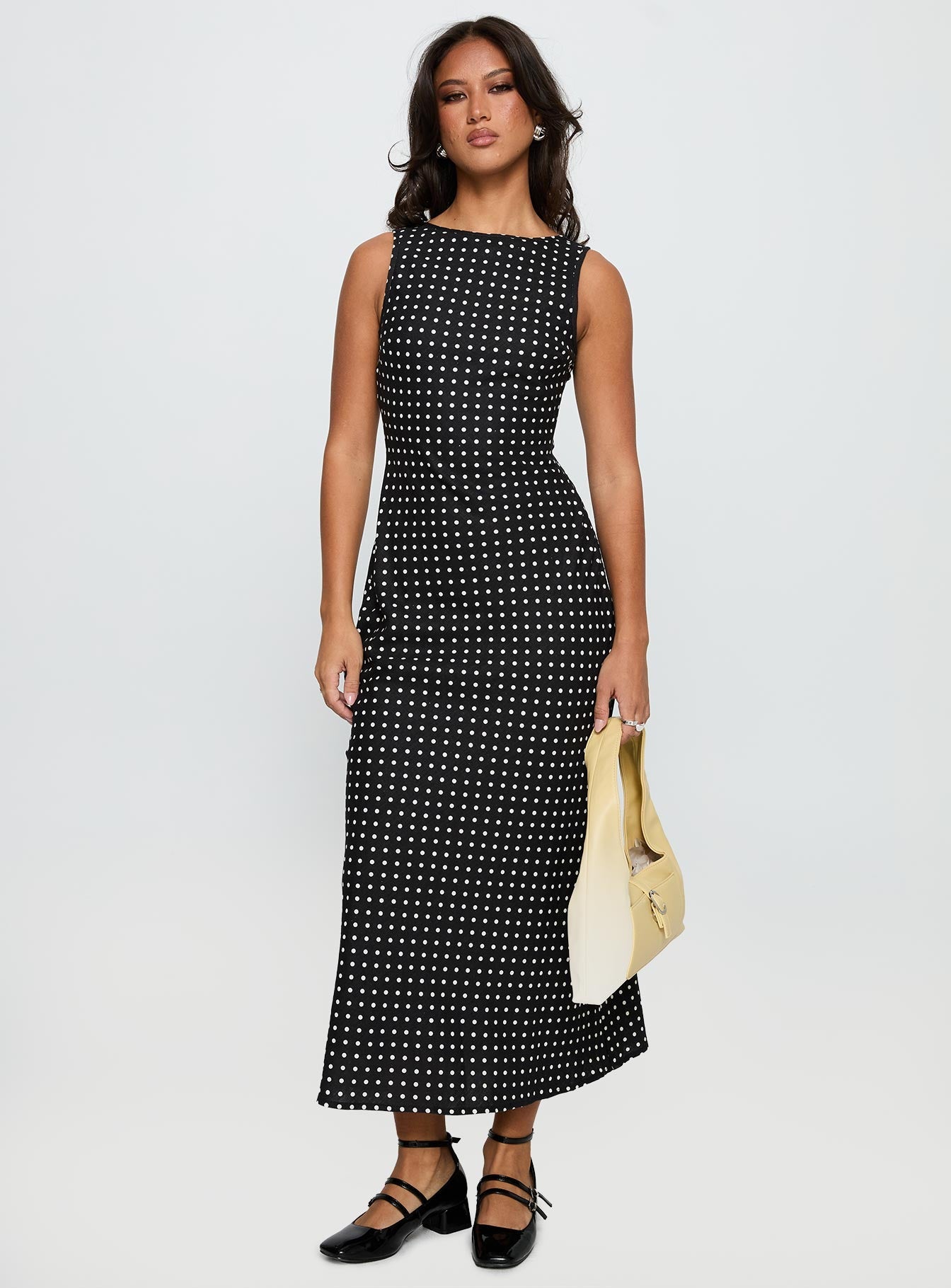 side view of model wearing Princess Polly Voyager Linen Blend Midi Dress Black Polka Crew Neck 