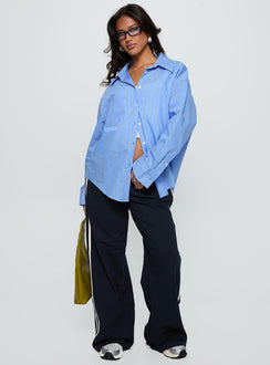 side view of model wearing Princess Polly Kodhi Oversized Long Sleeve Top Blue Stripe Full Sleeves V-Neck 
