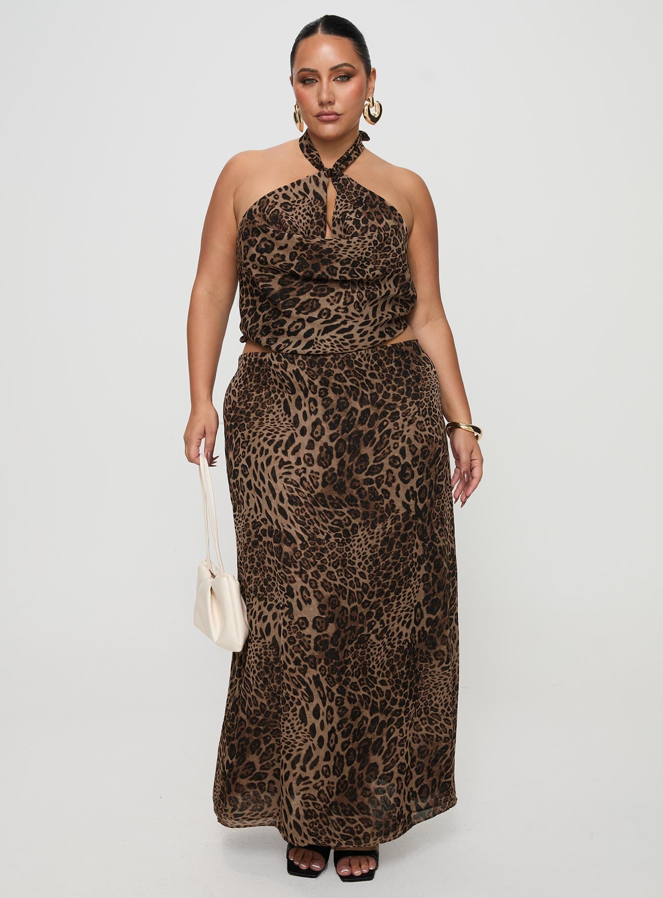   front view of model wearing Princess Polly Eleganza Maxi Skirt Leopard Curve Maxi 