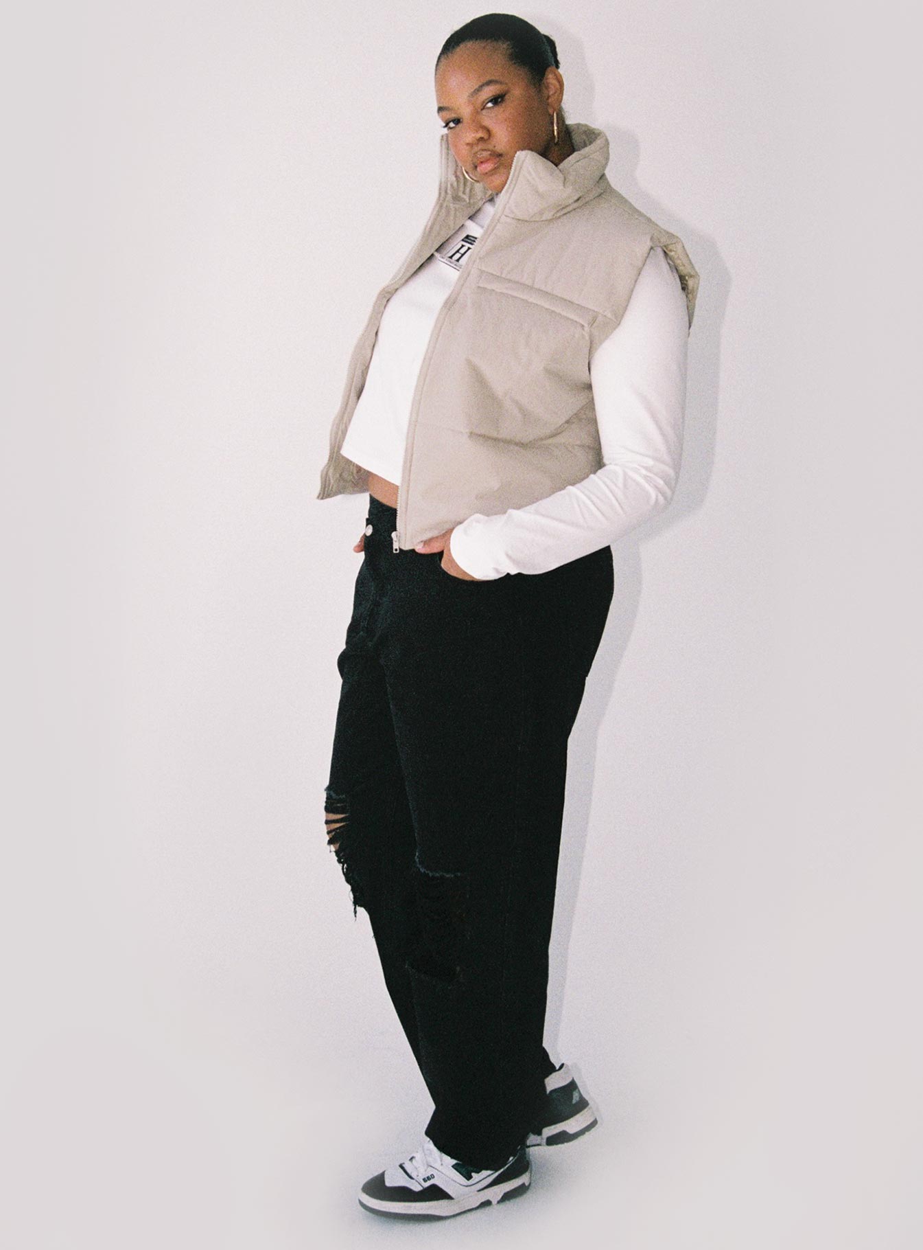 Puffer vest High neck Zip front fastening  Faux chest pocket 