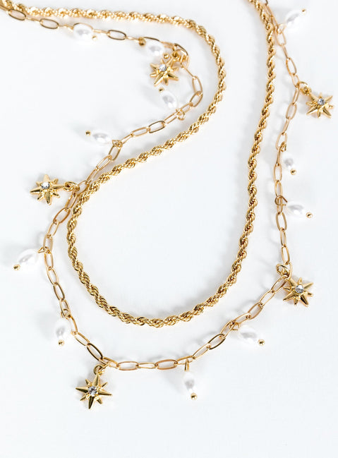 Gold-toned chain belt Drop charms, lobster clasp fastening, diamante and pearl detail