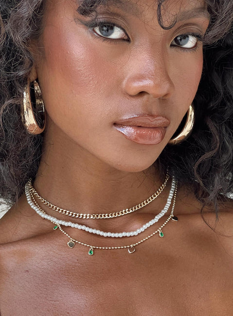 Necklace Gold toned Three chains - these can be worn separately Pearl and gemstone detail Lobster clasp fastening Adjustable lengths