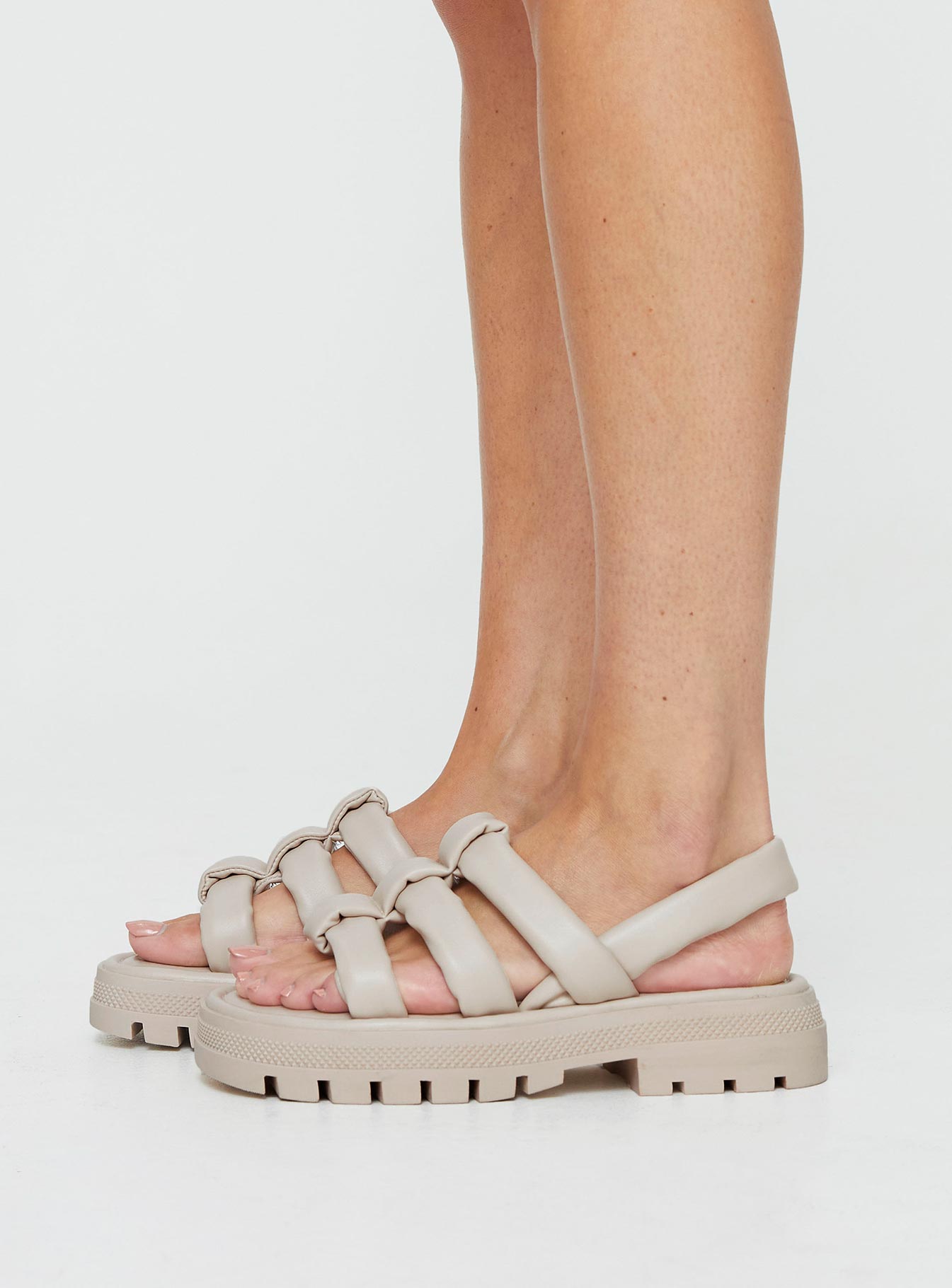 Sandals Chunky cleated outsole, open-round toe, padded T-bar upper design Padded Heel Strap with elastic for the perfect fit, padded Insole for superior comfort Faux leather