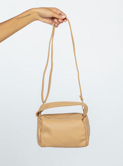 Bag Faux leather material Adjustable & removable shoulder strap Fixed handle Zip fastening Gold tones hardware Flat base