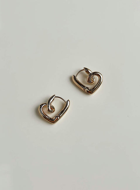 Earrings Gold toned Hinged hoop fastening