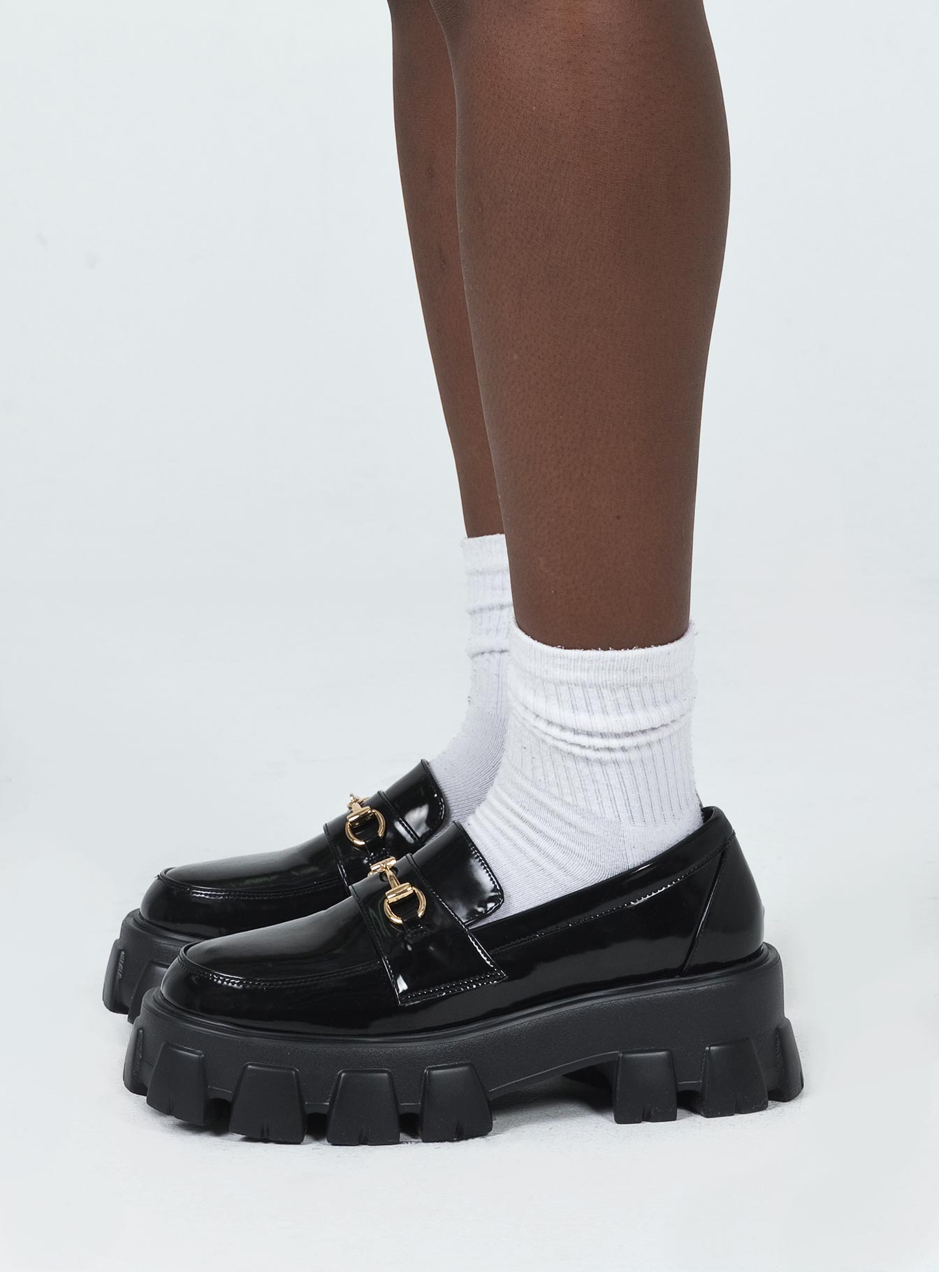 Loafers Faux patent leather Platform base Treaded sole Gold-toned snaffle detail Rounded toe