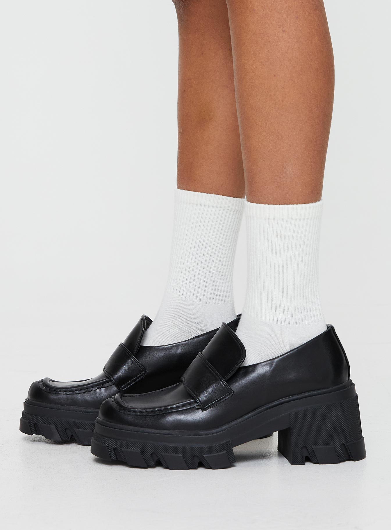 Faux leather loafer Rounded toe, platform base, padded footbed, treaded sole