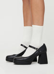 Faux leather loafer heels Single strap upper, silver-toned hardware, block heel, platform base, rounded toe