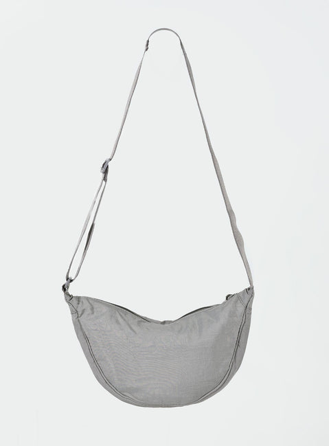 Crossbody bag Adjustable crossbody strap Zip fastening Internal card slip