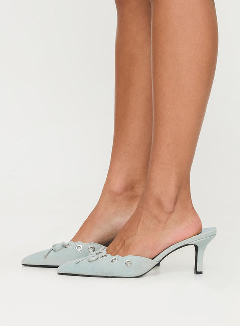 Slide on pump design, closed pointed toe, kitten heel, scalloped topline detail, metal eyelet detail, bow on upper Denim textile upper, non-leather outsole & heel