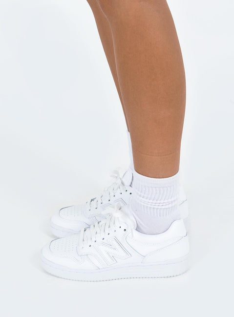 Sneakers Faux leather material Lace up fastening Padded footbed Rounded toe Treaded sole