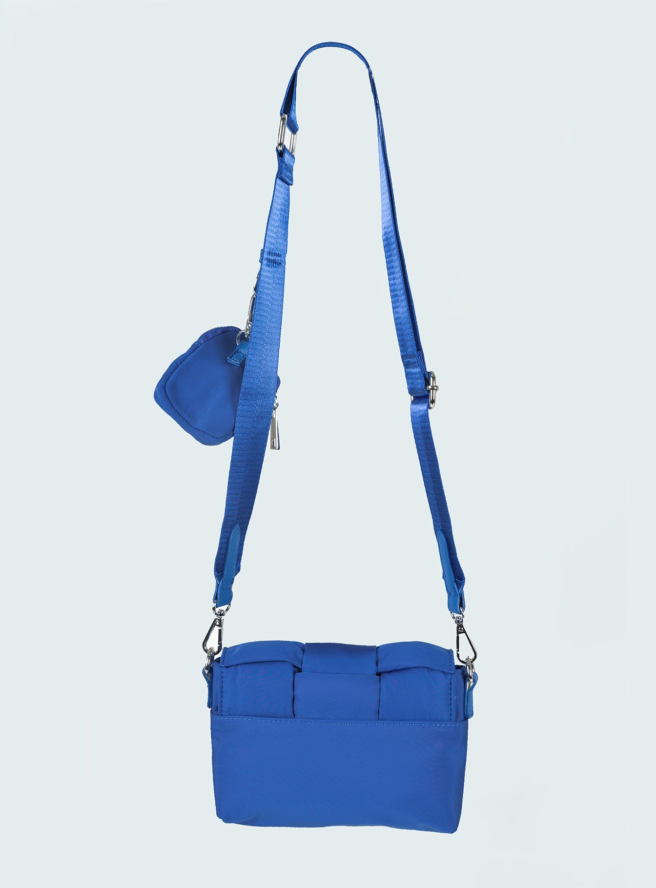 Bag Nylon material  Quilted look  Silver-toned hardware Removable crossbody strap  Removable coin purse on strap  Internal pockets 