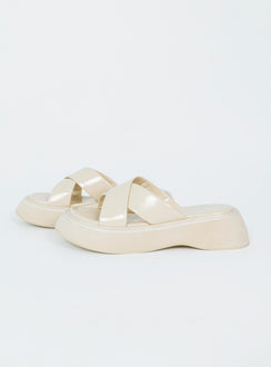 Flats Faux leather material  Cross strap upper  Platform base 