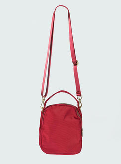 Crossbody bag Nylon material  Single handle  Four seperate compartments Gold-toned hardware Zip fastening Adjustable & removable crossbody strap 