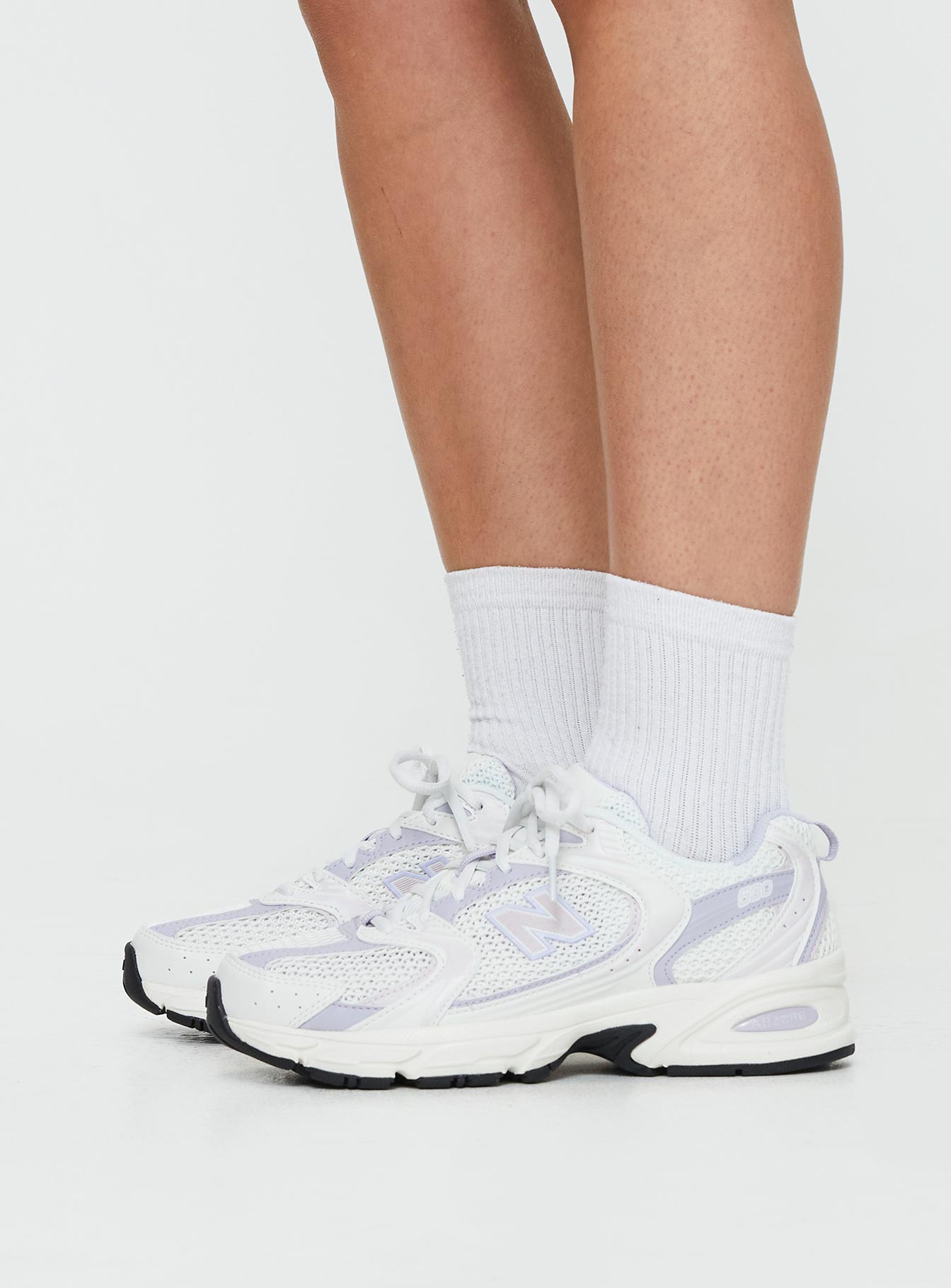 Sneakers Mesh netting throughout, lace-up fastening, pull tab at heel Treaded sole, Padded footbed