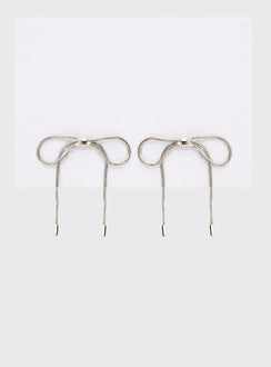 Silver-toned earrings Bow design, stud fastening