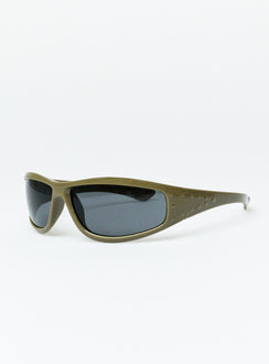 Sunglasses Wrap around design Light weight frame Brown tinted lenses Moulded nose bridge