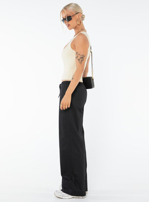 Cargo pants, mid-rise, relaxed fit Drawstring waist, four pocket design, wide leg Non-stretch material, unlined 