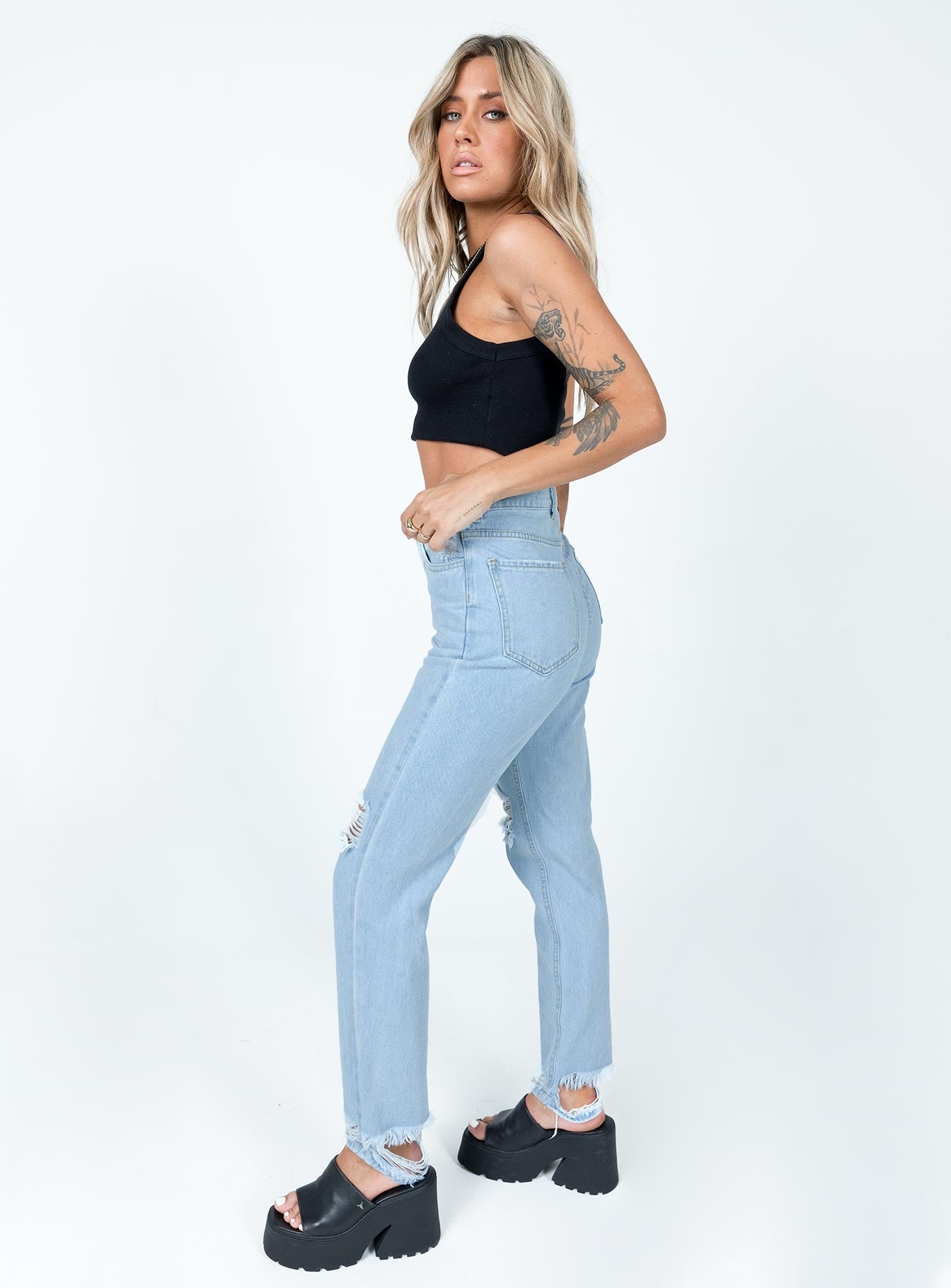 side view of model wearing Princess Polly Camile Jean Denim High Waisted 
