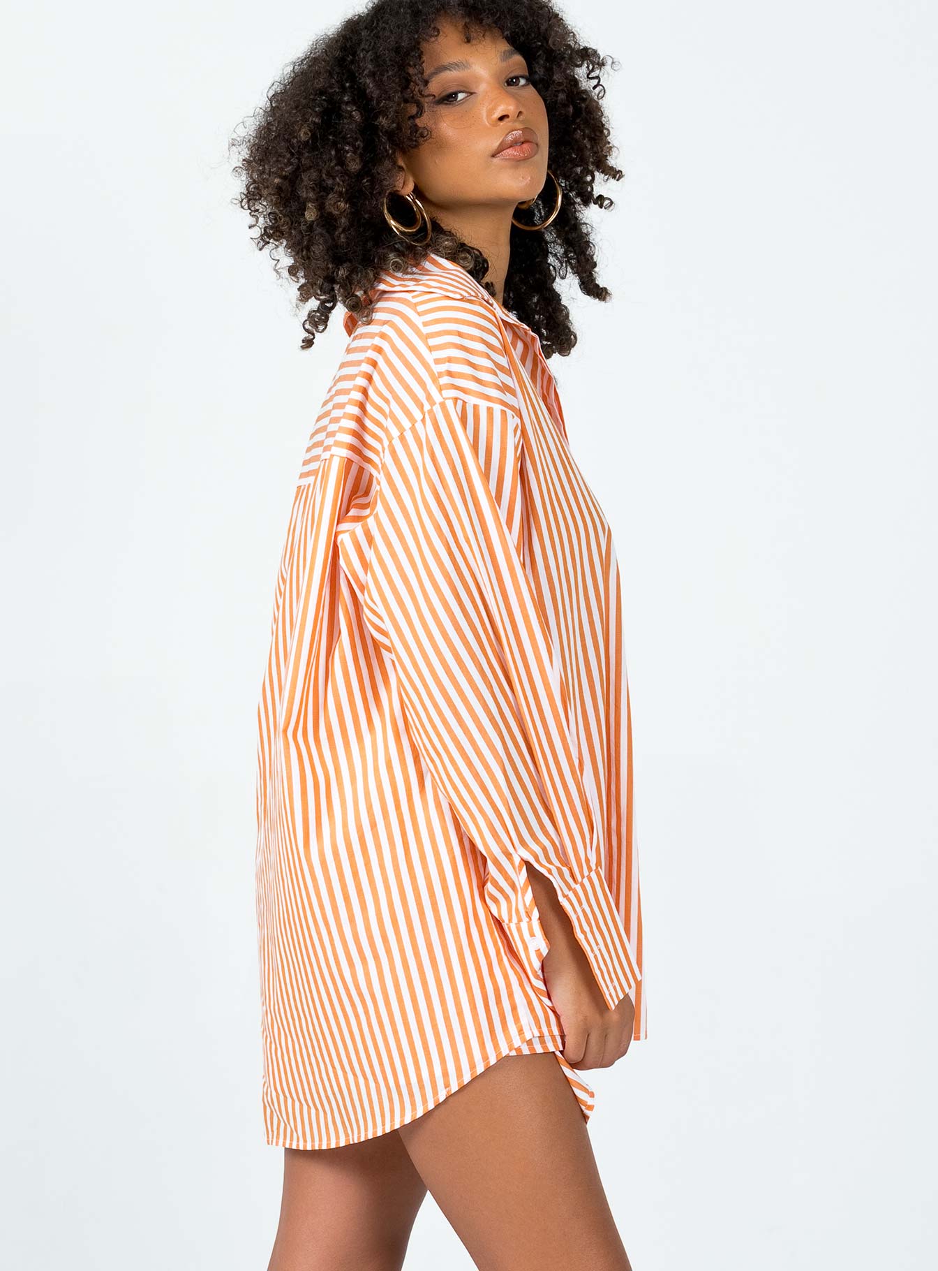 side view of model wearing Princess Polly Boyfriend Shirt Orange Full Sleeves 