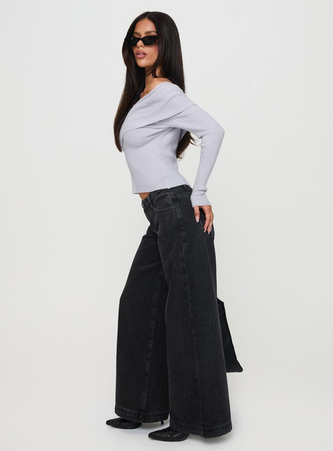 side view of model wearing Princess Polly Ribbon Stamp Wide Leg Jeans Washed Black Low Rise Jeans 
