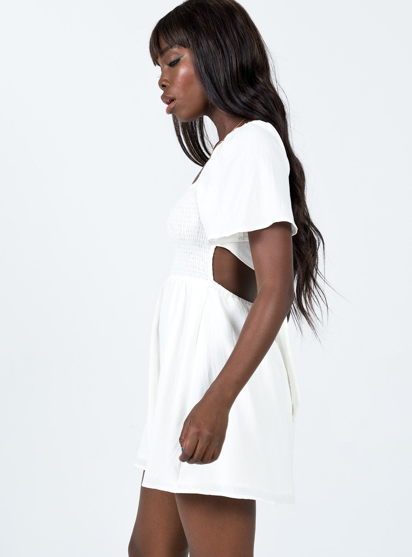 side view of model wearing Princess Polly Summer Nights Mini Dress White 