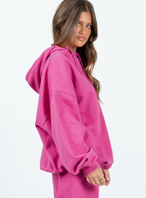 side view of model wearing Princess Polly Ritu Oversized Hoodie Pink 