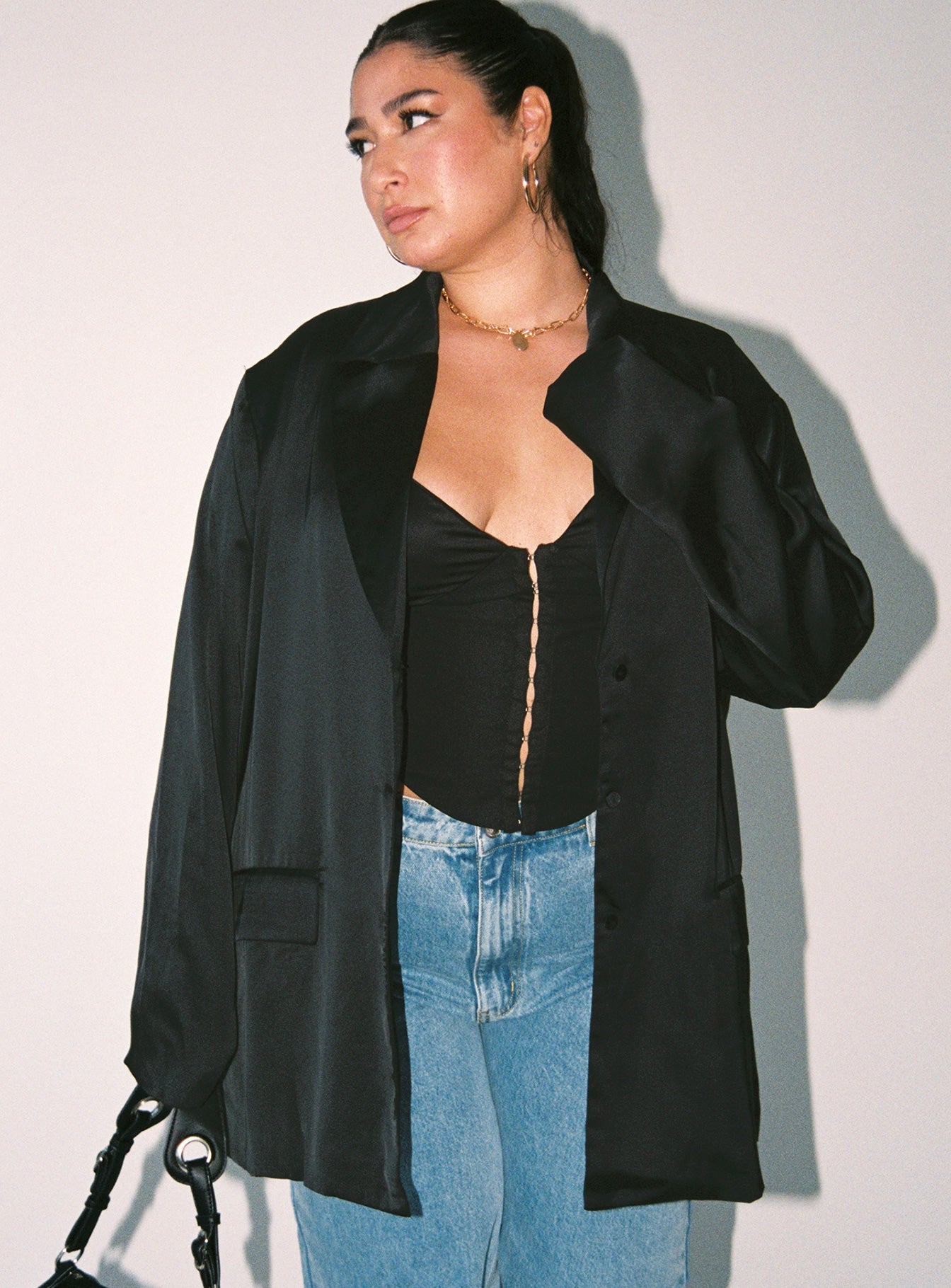 Blazer Satin material Lapel collar Button fastening at front Twin front pockets Slit at back Non-stretch Fully lined