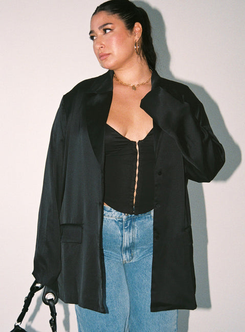 Blazer Satin material Lapel collar Button fastening at front Twin front pockets Slit at back Non-stretch Fully lined